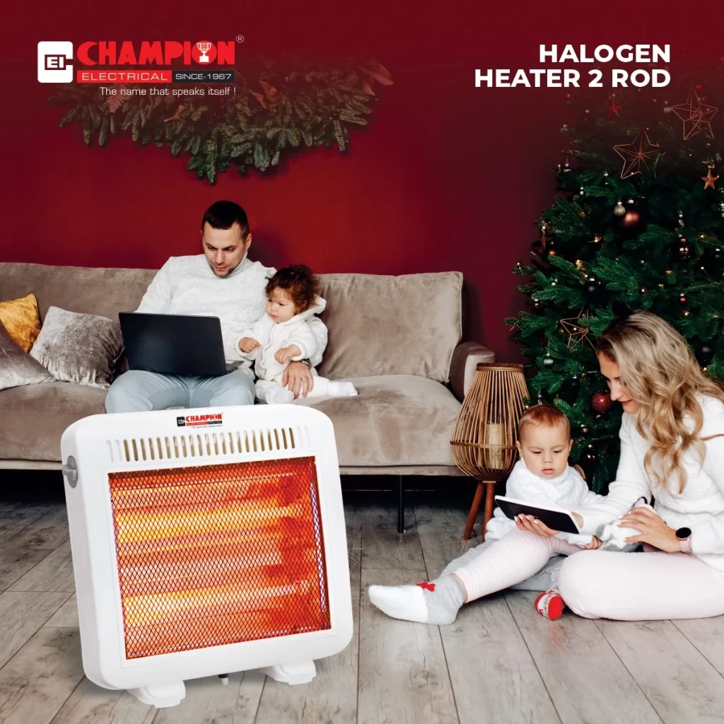 Family sitting together in a living room decorated for the holidays, with a Champion Electrical halogen heater in the foreground.